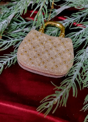 Zlat� kabelka na strom�ek